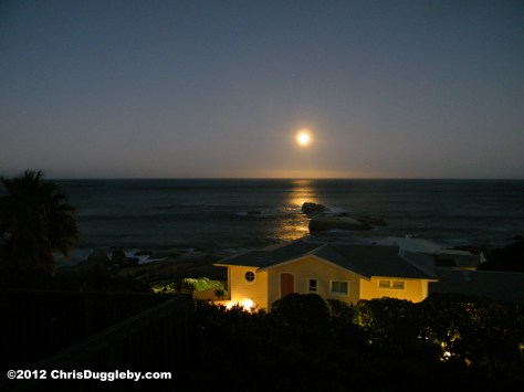 The full moon sets over my neighbour's house (Villa Lara) at Sunset Rocks