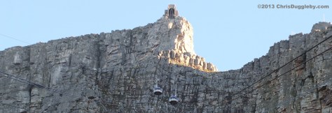 Table Mountain cable cars getting rather close as they overtake on a sunny Cape Town day