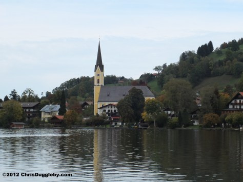 View of Schliersee church over lake Schliersee in Autumn (when it gets too cold for the parasites)