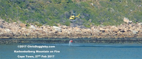All in a day's work: Cape Town Chopper Squad putting out fires on the rocks near Sandy Bay Beach